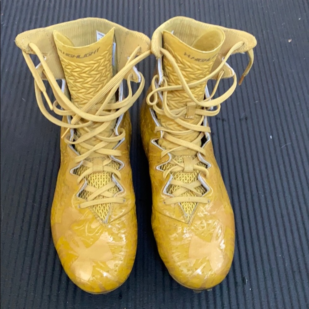 Gently used UA football Cleats